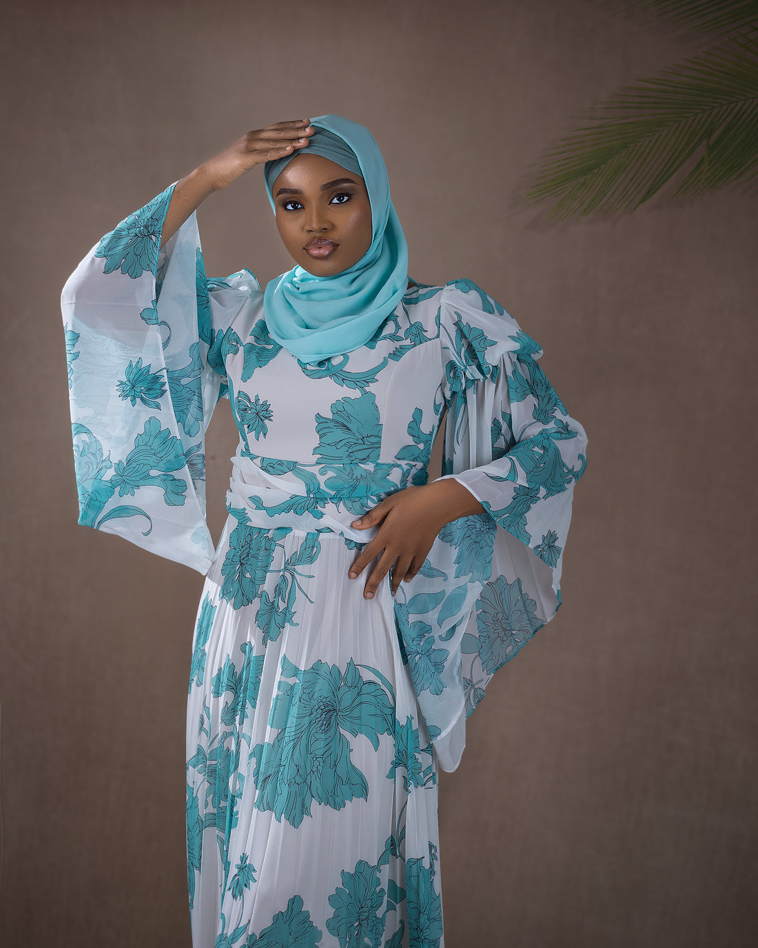 ruffle waist dress with dramatic sleeves